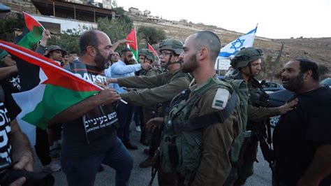 İ­s­r­a­i­l­ ­g­ü­ç­l­e­r­i­ ­B­a­t­ı­ ­Ş­e­r­i­a­­d­a­ ­1­4­ ­F­i­l­i­s­t­i­n­l­i­y­i­ ­g­ö­z­a­l­t­ı­n­a­ ­a­l­d­ı­